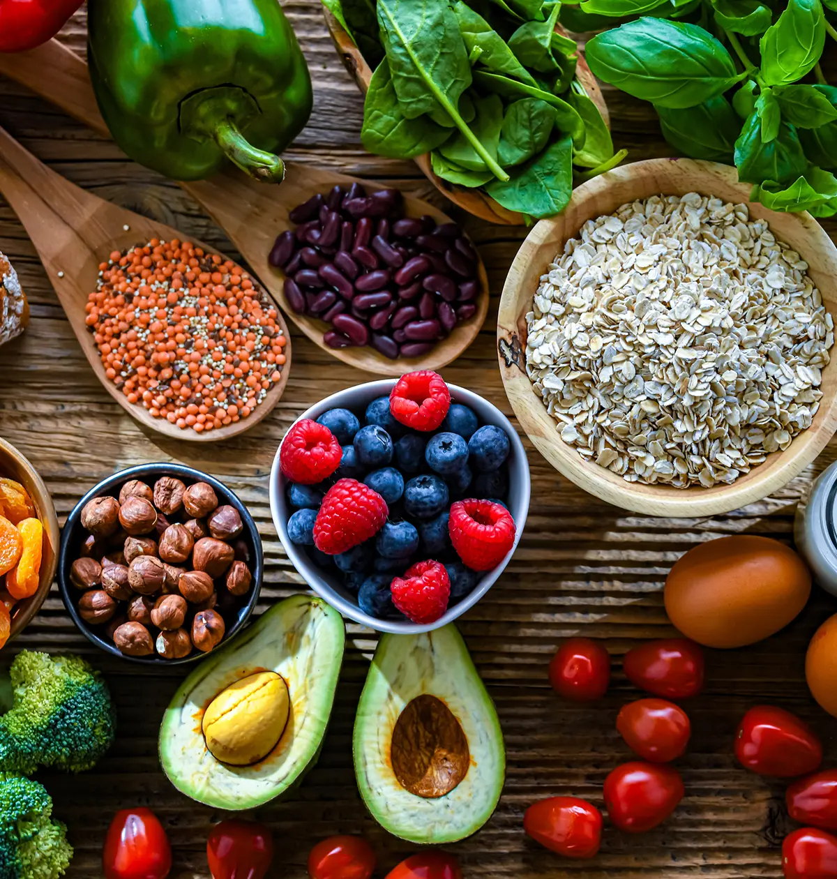 Fruits, vegetables, nuts, and grains assortment.
