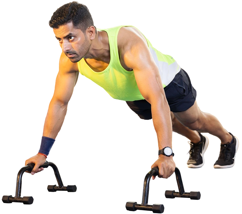 Man doing push-ups with push-up bars.
